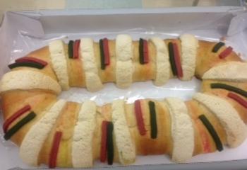 Rosca de los Reyes bread in a container